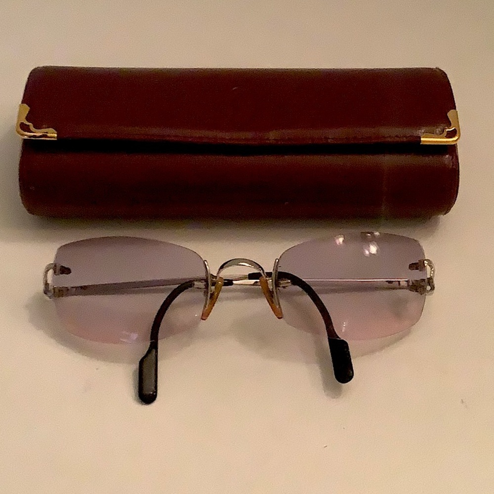Cartier platinum rimless glasses with hard case and cleaning cloth
